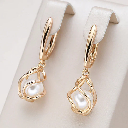 Elegante Perlenohrringe in Gold